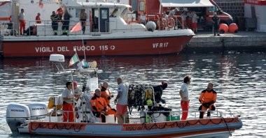 A rescue boat resumes search operations at the site where a luxury yacht sank off the coast of Porticello, near Palermo, Italy, on August 23, 2024. (Reuters Photo) 