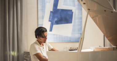 Renowned pianist Riad Mammadov plays the piano during rehearsal, Antalya, Türkiye, April 28, 2025. (AA Photo)
