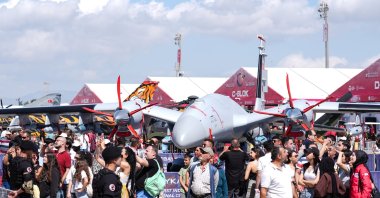 Crowds of people are photographed next to the Bayraktar Akıncı unmanned aerial vehicle, developed by Turkish drone giant Baykar, at Teknofest 2025 held in Lefkoşa, Turkish Republic of Northern Cyprus (TRNC), May 1, 2025. (AA Photo)