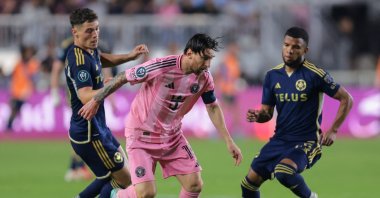 Inter Miami forward Lionel Messi (C) dribbles the ball past Vancouver Whitecaps midfielder Sebastian Berhalter (L) during the second half at Chase Stadium, Fort Lauderdale, U.S., April 30, 2025. (Reuters Photo)