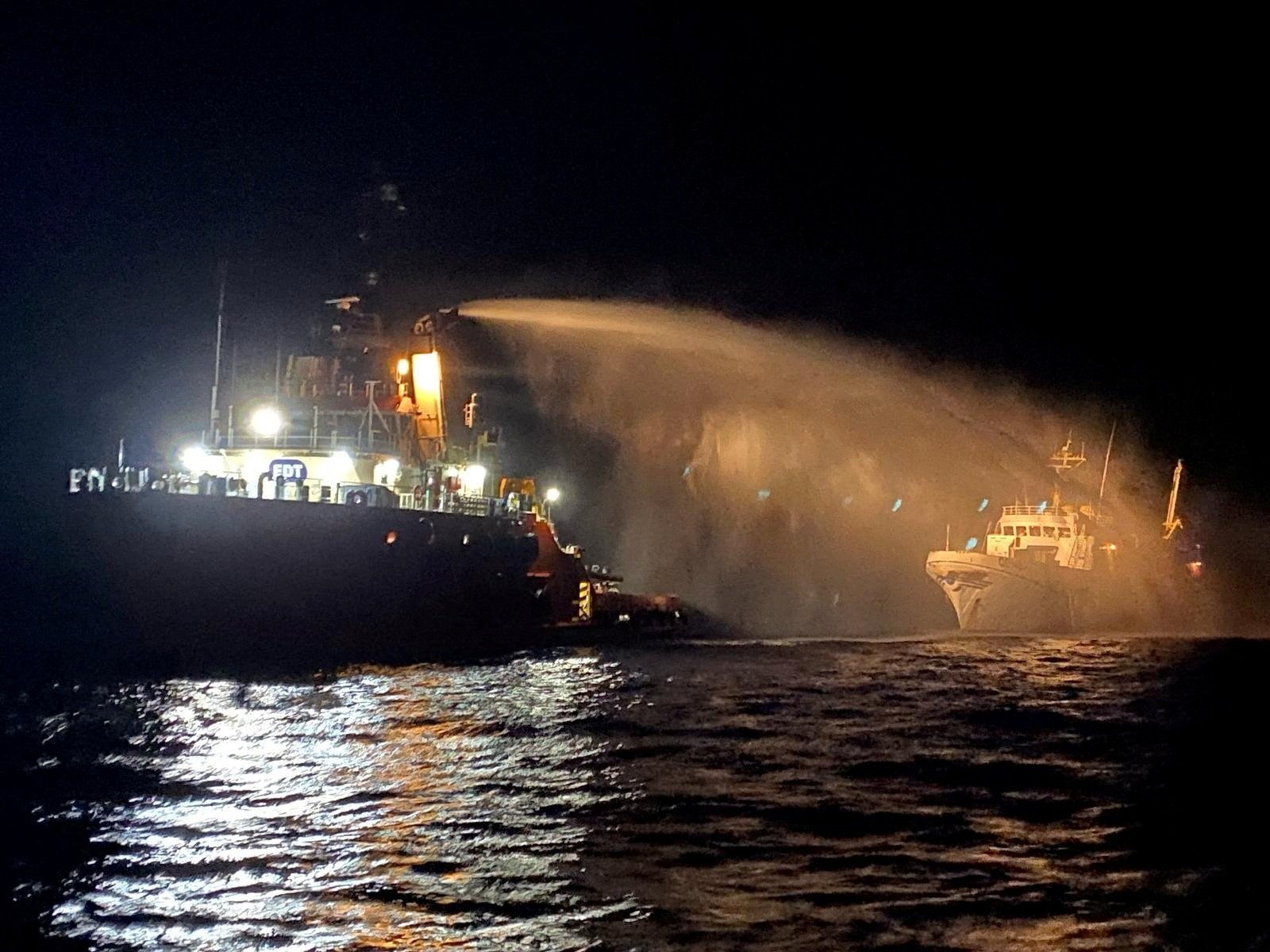 A tug vessel puts out a fire on the Gaza Freedom Flotilla vessel Conscience outside Maltese territorial waters in this handout picture provided by the Malta Government Department of Information, May 2, 2025. (Reuters Photo)