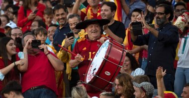 Well-known Spain fan Manuel Caceres Artesero, also known as "Manolo El del Bombo" ("Manolo the Marching Bass Drummer"), cheers on his team during the UEFA Nations League match between Spain and Portugal, Seville, Spain, June 2, 2022. (AFP Photo)