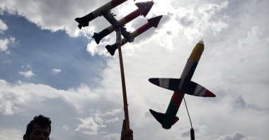 Houthi supporters hold up a mock missile and drone during an anti-USA protest, in Sana'a, Yemen, May 2, 2025. (EPA Photo)