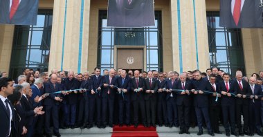President Recep Tayyip Erdoğan cuts the ribbon as he inaugurates the new presidential complex of the Turkish Republic of Northern Cyprus’ (TRNC), in the capital, Lefkoşa (Nicosia), TRNC, May 3, 2025. (AA Photo)