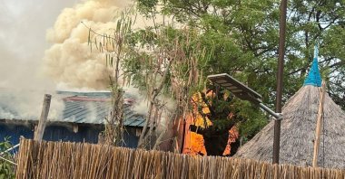 A fire burns following an aerial bombardment that resulted in casualties at the medical charity Medecins Sans Frontieres run facility, destroying the last remaining hospital and pharmacy in the northern town of Old Fangak, Fangak county, South Sudan, May 3, 2025. (Reuters Photo)