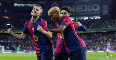 Barcelona's Fermin Lopez (L) celebrates scoring his team's second goal during the La Liga match against Real Valladolid at the Jose Zorrilla stadium, Valladolid, Spain, May 3, 2025. (AFP Photo)