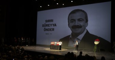 Sırrı Süreyya Önder&#039;s daughter Ceren Kandemir Önder speaks at the commemoration ceremony for her father next to his coffin, Istanbul, Türkiye, May 4, 2025. (AA Photo)