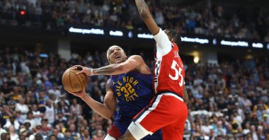 Clippers&#039; Derrick Jones Jr. defends against Nuggets&#039; Aaron Gordon during an NBA playoffs game in Denver, Colorado, May 03, 2025. (AFP Photo)