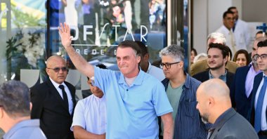 Former Brazilian President Jair Bolsonaro waves to supporters as he leaves the DF Star clinic, Brasilia, Brazil, May 4, 2025. (AFP Photo)