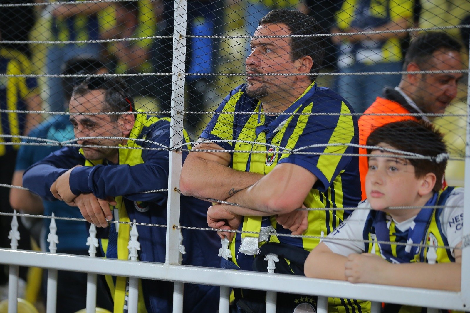 Fenerbahçe fans look dejected during the Süper Lig match against Beşiktaş at the Ülker Stadium, Istanbul, Türkiye, April 4, 2025. (DHA Photo)