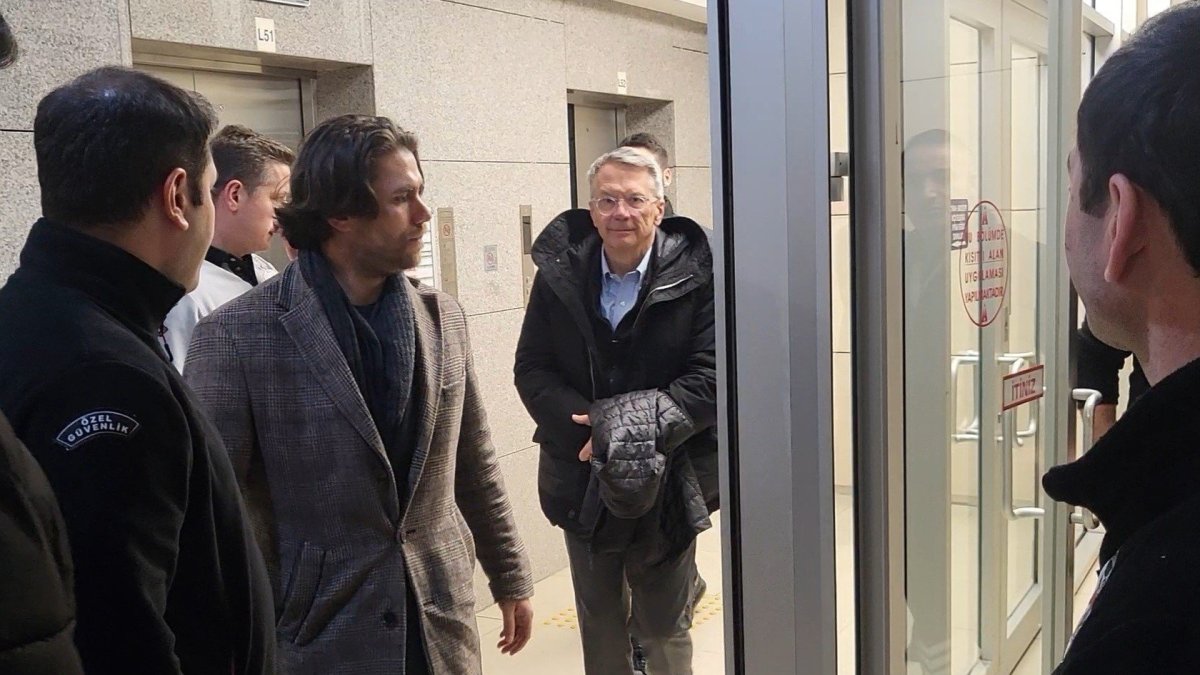 Police escort TÜSIAD executive Ömer Aras to the courthouse, Istanbul, Türkiye, Feb. 19, 2025. (IHA Photo)
