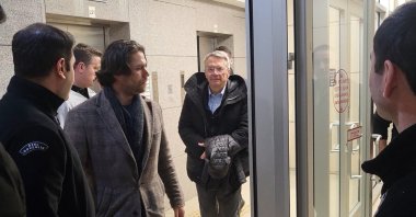 Police escort TÜSIAD executive Ömer Aras to the courthouse, Istanbul, Türkiye, Feb. 19, 2025. (IHA Photo)
