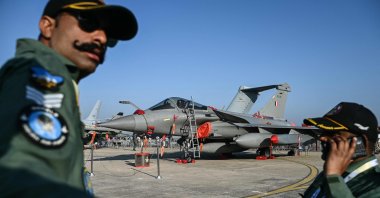 Indian Air Force (IAF) personnel stand in front of the Rafale fighter jet during Aero India 2025, in Bengaluru, India, Feb. 13, 2025. (AFP Photo)