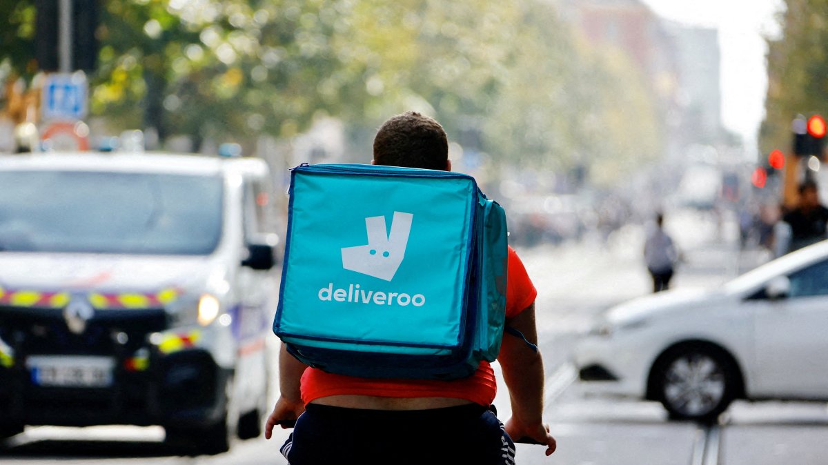 A delivery worker with Deliveroo rides a bike, Nice, France, Oct. 25, 2022. (Reuters Photo)