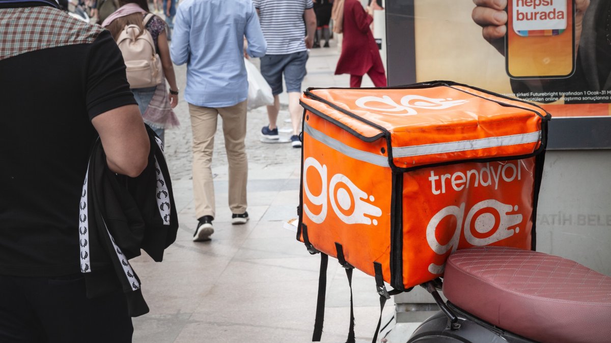 Trendyol Go logo on a local courier delivery bike, Istanbul, Türkiye, May 22, 2022. (Shutterstock Photo)