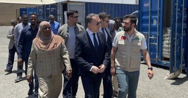 Türkiye’s Ambassador to Khartoum Fatih Yıldız welcomes Humanitarian Relief Foundation (IHH) volunteers as the &quot;Ship of Goodness&quot; arrives at Port Sudan, Sudan, May 5, 2025. (AA Photo)
