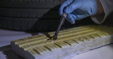 In this undated photo in an undisclosed location, an officer from the Turkish police&#039;s Trace Investigation Unit works on crime scene evidence at a laboratory. (AA Photo)