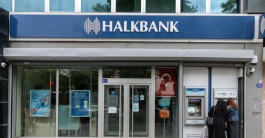 People are seen using ATMs at Halkbank in the capital Ankara, Türkiye, Jan. 5, 2021. (Reuters Photo)