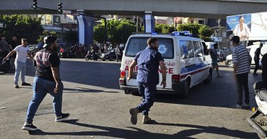 An ambulance carries wounded people whose handheld pagers exploded, Beirut, Lebanon, Sept. 17, 2024. (AP Photo)