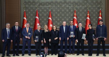 President Recep Tayyip Erdoğan poses with journalists who won Anatolian Media Awards, Ankara, Türkiye, May 6, 2025. (AA Photo)