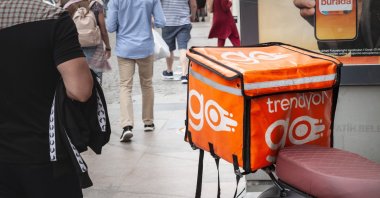 Trendyol Go logo on a local courier delivery bike, Istanbul, Türkiye, May 22, 2022. (Shutterstock Photo)