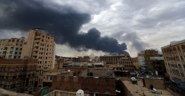 Smoke billows on the horizon following an Israeli air strike on Houthi-held capital Sanaa, Yemen, May 6, 2025. (AFP Photo)
