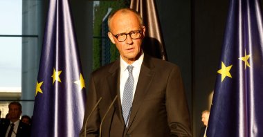 Newly elected German Chancellor Friedrich Merz speaks as his predecessor listens during a handover ceremony at the Chancellery in Berlin, Germany, May 6, 2025. (AFP Photo)