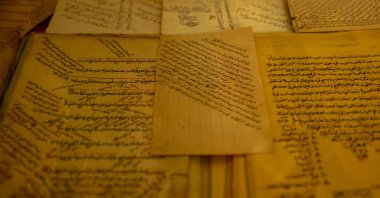 Rare historic manuscripts by medieval poet Enveri are being carefully preserved in Irbil, Iraq, May 13, 2025. (AA Photo)