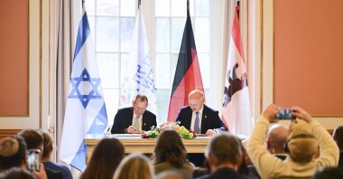 Ron Huldai (L), mayor of Tel Aviv, and Kai Wegner (CDU), governing mayor of Berlin, sign a city partnership between Berlin and Tel Aviv, Rathaus, Berlin, May 5, 2025. (AP Photo)