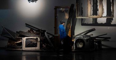 A child visits an exhibition on the Russia-Ukraine war at the National Museum of the History of Ukraine in World War II, Kyiv, Ukraine, May 2, 2025. (AFP Photo)
