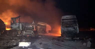A handout screen grab taken from a video released by Houthis-run al-Masirah TV shows flames and smoke rising from the fuel port of Ras Isa following U.S. airstrikes, in the port province of Hodeidah, Yemen, April 18, 2025. (EPA Photo)