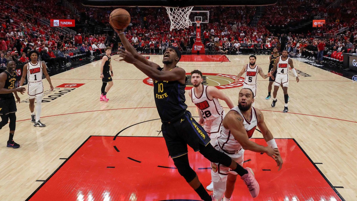 Golden State Warriors&#039; Jimmy Butler III (L) goes up for a lay-up against Houston Rockets&#039; Dillon Brooks in the second half in Game 7 of the Western Conference First Round NBA Playoffs at Toyota Center, Houston, U.S., May 4, 2025. (AFP Photo)