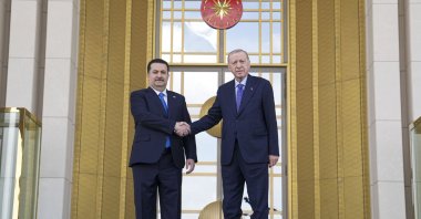 President Recep Tayyip Erdoğan (R) shakes hands with Iraqi Prime Minister Mohammed S. Al Sudani ahead of their meeting at the Presidential Complex, Ankara, Türkiye, May 8, 2025. (AA Photo)
