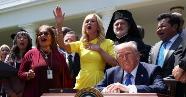 Paula White, senior advisor to the White House Faith Office, gestures while leading a prayer next to U.S. President Donald Trump and faith leaders, during the National Day of Prayer, in the Rose Garden at the White House, Washington, U.S., May 1, 2025. (Reuters Photo)