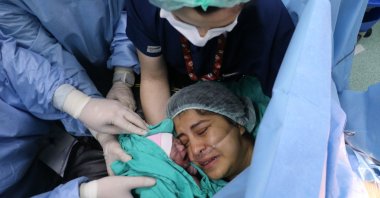 Ayfer Sarıtaş meets her baby, Umut, for the first time after giving birth, Istanbul, Türkiye, May 7, 2025. (AA Photo)
