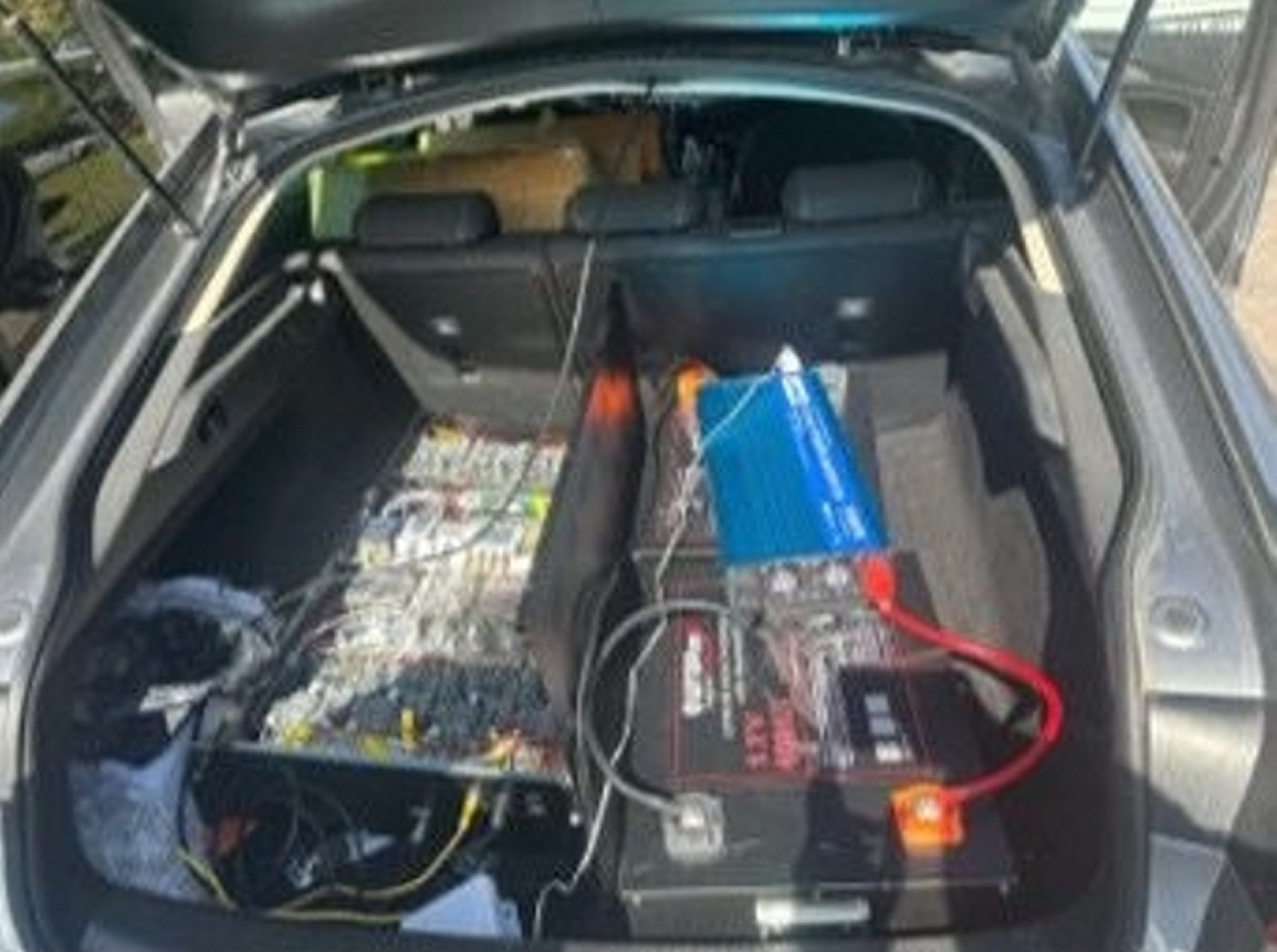 In this handout photo from security sources, a fake cell tower set up is seen in the trunk of a rental vehicle the suspects were using, Istanbul, Türkiye. (AA Photo)