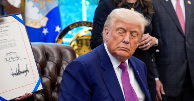 U.S. President Donald Trump signs executive orders and speaks to reporters in the Oval Office of the White House in Washington, DC, U.S., May 9, 2025. (EPA Photo)