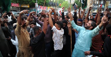 Pakistani people dance and celebrate after a cease-fire was agreed between Pakistan and India, Hyderabad, Pakistan, May 10, 2025. (EPA Photo)