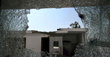 A shattered window of a house is pictured after cross-border shelling amid a surge in border tensions between India and Pakistan, Arnia, India, May 10, 2025. (AFP Photo)