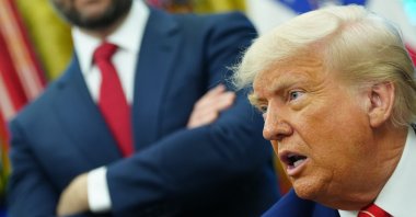 U.S. Vice President JD Vance (L) looks on as President Donald Trump (R) announces a trade agreement between the U.S. and Britain, the White House, Washington, D.C., U.S., May 8, 2025. (EPA Photo)