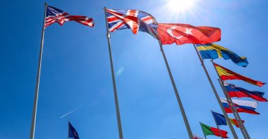 Flags of NATO member countries flutter during a ceremony at NATO headquarters, Brussels, Belgium, April 28, 2025. (EPA Photo)