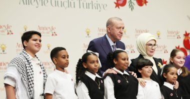 President Recep Tayyip Erdoğan and first lady Emine Erdoğan pose with children during a Mother&#039;s Day event, Istanbul, Türkiye, May 10, 2025. (AA Photo)