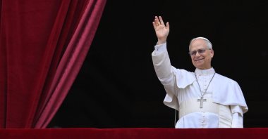 Pope Leo XIV waves as he leads the Regina Caeli prayer from the central loggia of St. Peter's Basilica in Vatican City, May 11, 2025. (EPA Photo)
