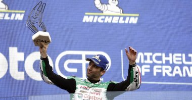 French rider Johann Zarco of LCR Honda Team celebrates winning the French MotoGP at Le Mans, France, May 11, 2025. (EPA Photo)