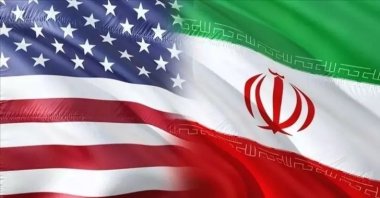 The illustration shows the U.S. and Iran flags. (DHA)