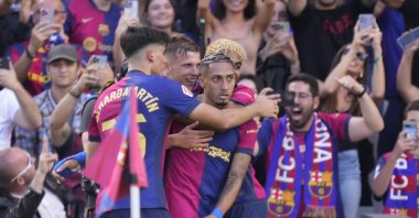 FC Barcelona&#039;s Raphinha (R) celebrates with his teammates after scoring during the Spanish La Liga match against Real Madrid, Barcelona, Spain, May 11, 2025. (AA Photo)