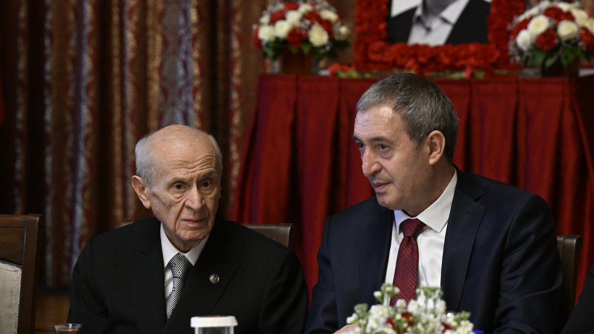 DEM Party co-chair Tuncer Bakırhan (R) talks to MHP leader Devlet Bahçeli (L), architect of the terror-free Türkiye initiative, at an event, Ankara, Türkiye, May 7, 2025. (AA Photo)