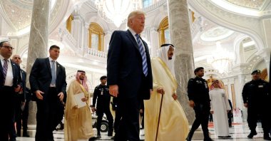 U.S. President Donald Trump walks with Saudi Arabia&#039;s King Salman bin Abdulaziz Al Saud in Riyadh, Saudi Arabia, May 21, 2017. (Reuters Photo)