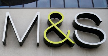 A Marks &amp; Spencer (M&amp;S) logo is seen on the outside of a store in Cheshire, U.K., Aug. 18, 2020. (Reuters Photo)