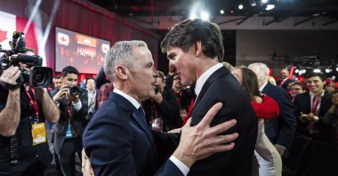 Mark Carney, leader of the Liberal Party of Canada, embraces Prime Minister Justin Trudeau after being announced the winner at the Liberal Leadership Event, Ottawa, Ontario, March 9, 2025. (AP Photo)